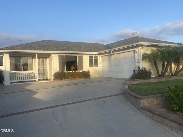 312 Rhodes Ct, Fillmore, CA 93015 - ranch-style house with driveway, a garage, and a shingled roof