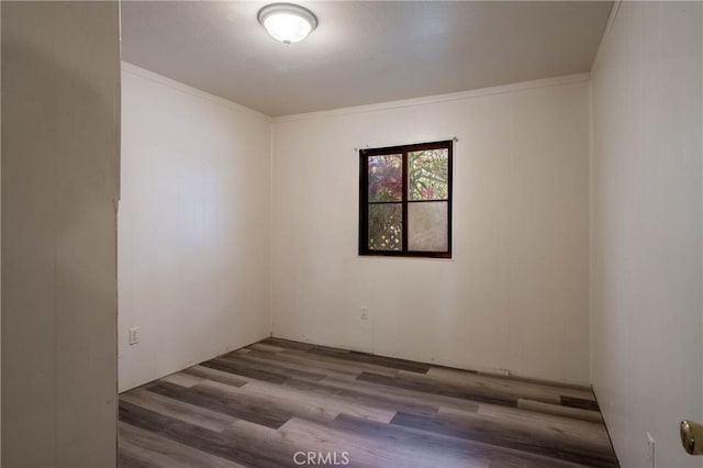 14410 Walnut Ave, Clearlake, CA 95422 - unfurnished room featuring wood finished floors and ornamental molding