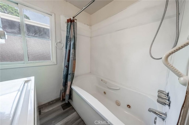14410 Walnut Ave, Clearlake, CA 95422 - bathroom featuring a combined bath / shower with jetted tub and wood finished floors