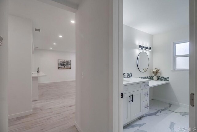 1125 Evilo St, El Cajon, CA 92021 - bathroom with vanity, recessed lighting, and wood finished floors