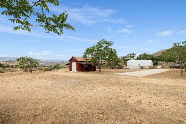35122 Red Rover Mine Rd, Acton, CA 93510 - view of yard featuring a mountain view and an outdoor structure