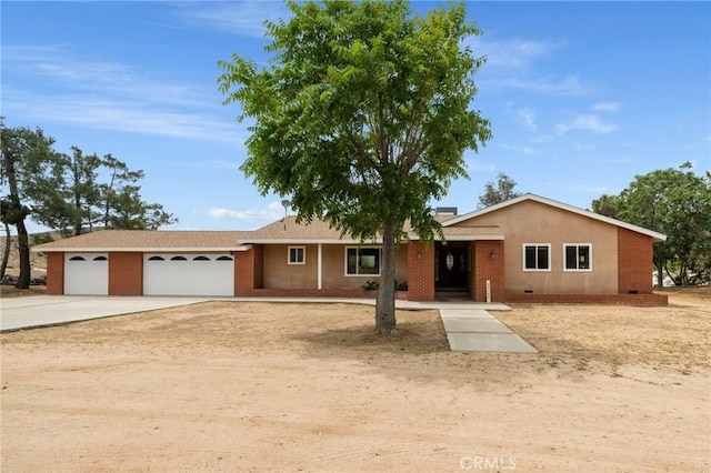 35122 Red Rover Mine Rd, Acton, CA 93510 - ranch-style home with a garage, concrete driveway, and brick siding