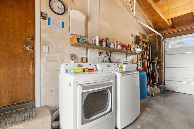 35122 Red Rover Mine Rd, Acton, CA 93510 - laundry room with washing machine and clothes dryer and a garage