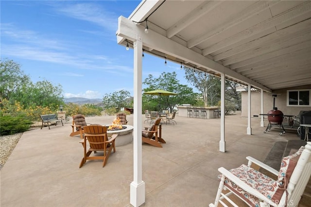 35122 Red Rover Mine Rd, Acton, CA 93510 - view of patio / terrace with an outdoor fire pit and a mountain view