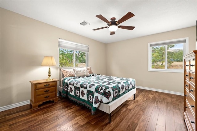 35122 Red Rover Mine Rd, Acton, CA 93510 - bedroom with multiple windows, wood finished floors, and ceiling fan