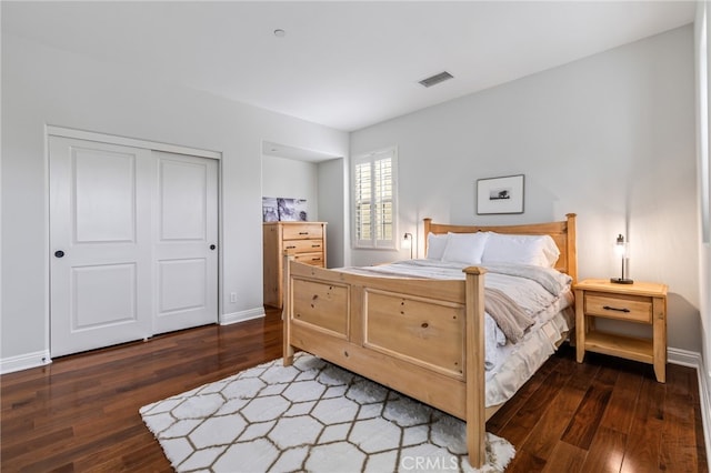 12 John, Ladera Ranch, CA 92694 - bedroom featuring wood finished floors, a closet, and baseboards
