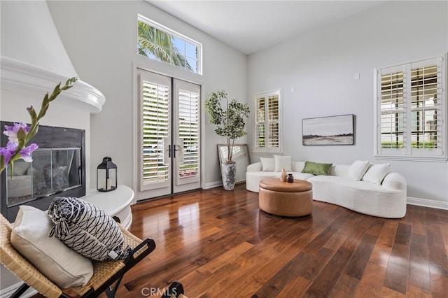 12 John, Ladera Ranch, CA 92694 - living room with healthy amount of natural light, wood finished floors, and baseboards