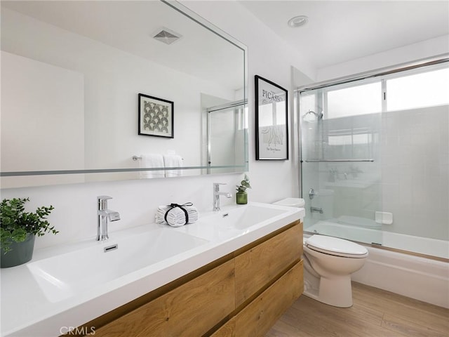 4918 Delacroix Rd, Rancho Palos Verdes, CA 90275 - bathroom featuring double vanity, combined bath / shower with glass door, and wood finished floors