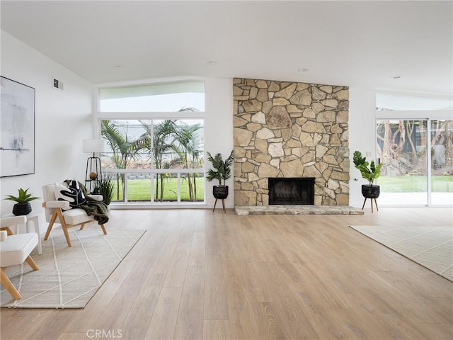 4918 Delacroix Rd, Rancho Palos Verdes, CA 90275 - living room with wood finished floors and a stone fireplace