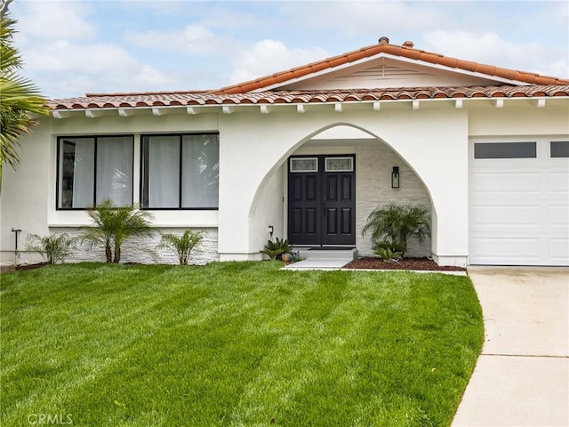 4918 Delacroix Rd, Rancho Palos Verdes, CA 90275 - view of front of home featuring a front lawn, stucco siding, a tile roof, and an attached garage