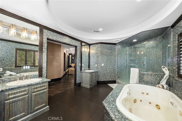 451 W Le Roy Ave, Arcadia, CA 91007 - full bathroom featuring vanity, a shower stall, a tub with jets, tile patterned floors, and tile walls