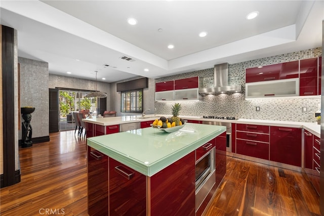 451 W Le Roy Ave, Arcadia, CA 91007 - kitchen featuring red cabinetry, wall chimney range hood, dark wood-style floors, stainless steel dishwasher, and a center island