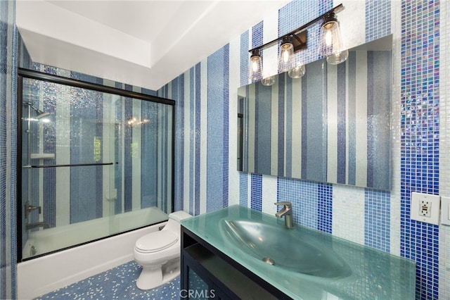 451 W Le Roy Ave, Arcadia, CA 91007 - bathroom with toilet, vanity, shower / bath combination with glass door, wallpapered walls, and tasteful backsplash