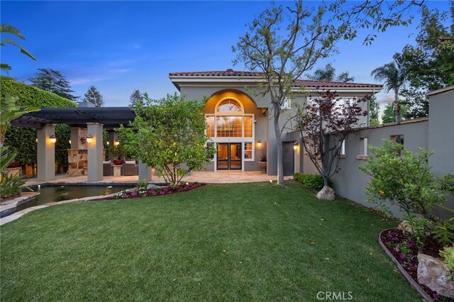 451 W Le Roy Ave, Arcadia, CA 91007 - back of property with stucco siding, french doors, a yard, and a patio