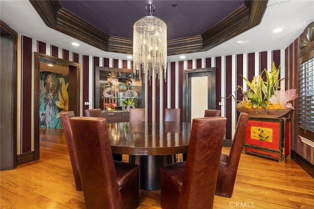 451 W Le Roy Ave, Arcadia, CA 91007 - dining area with wallpapered walls, ornamental molding, a chandelier, a tray ceiling, and wood finished floors