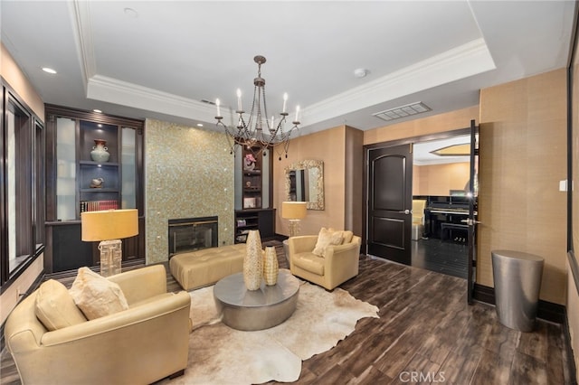 451 W Le Roy Ave, Arcadia, CA 91007 - living area with a tray ceiling, ornamental molding, wood finished floors, a chandelier, and a large fireplace