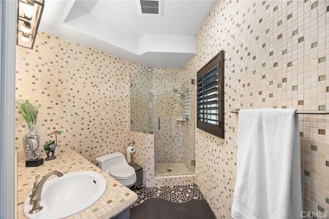 451 W Le Roy Ave, Arcadia, CA 91007 - bathroom with tile walls, a stall shower, toilet, tile patterned flooring, and vanity