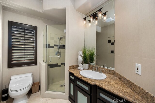 451 W Le Roy Ave, Arcadia, CA 91007 - full bathroom featuring vanity, a shower stall, toilet, and tile patterned flooring