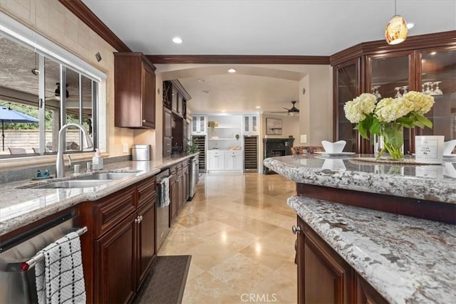 5131 Via Del Valle St, La Verne, CA 91750 - kitchen with a sink, stainless steel dishwasher, light stone counters, ceiling fan, and glass insert cabinets