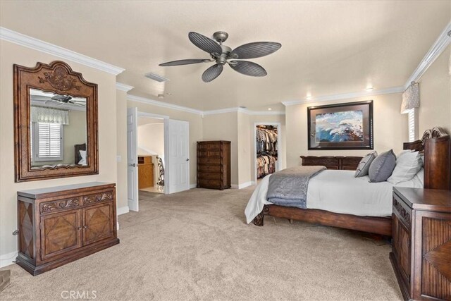 5131 Via Del Valle St, La Verne, CA 91750 - bedroom featuring ornamental molding, light carpet, baseboards, a closet, and a walk in closet