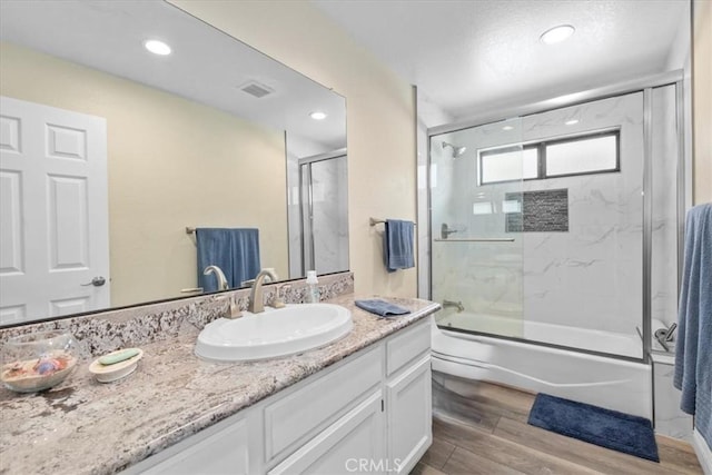 5131 Via Del Valle St, La Verne, CA 91750 - bathroom featuring vanity, shower / bath combination with glass door, wood finished floors, and recessed lighting