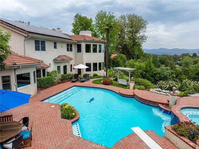 25578 Via Paladar, Valencia, CA 91355 - view of swimming pool with a patio, a mountain view, a pergola, and a pool with connected hot tub