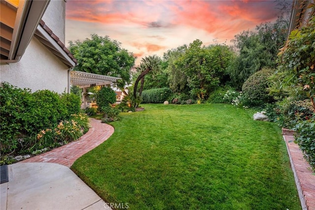 25578 Via Paladar, Valencia, CA 91355 - yard at dusk featuring a yard and a pergola