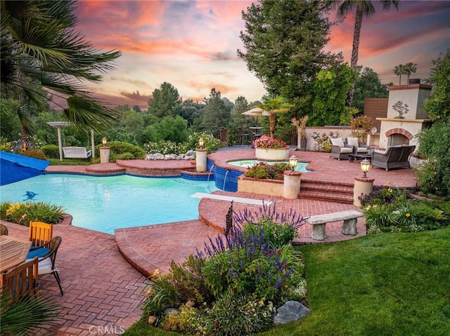 25578 Via Paladar, Valencia, CA 91355 - swimming pool featuring a patio area, a jacuzzi, and an outdoor living space with a fireplace
