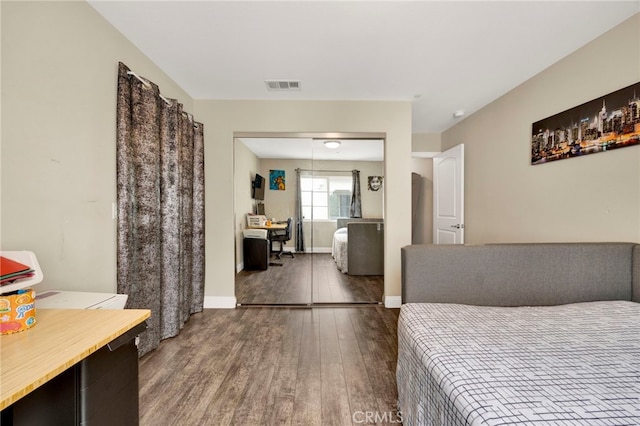 7021 Passons Blvd, Pico Rivera, CA 90660 - bedroom featuring wood finished floors and an office area