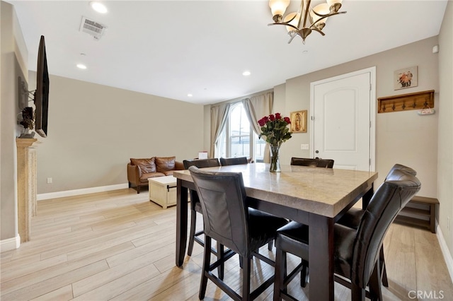 7021 Passons Blvd, Pico Rivera, CA 90660 - dining area with a chandelier, light wood finished floors, and recessed lighting