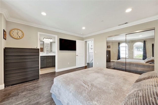7021 Passons Blvd, Pico Rivera, CA 90660 - bedroom with recessed lighting, crown molding, dark wood-style floors, a closet, and connected bathroom