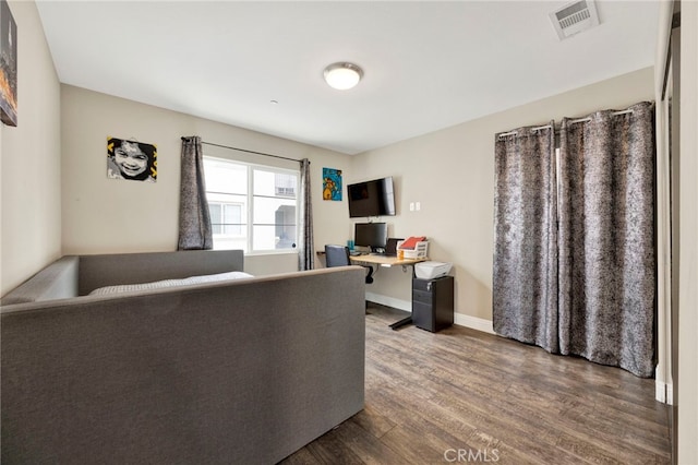 7021 Passons Blvd, Pico Rivera, CA 90660 - office with dark wood-type flooring and baseboards