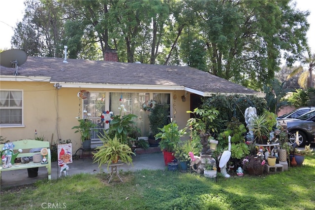 500 E Longden Ave, Arcadia, CA 91006 - view of front of property featuring a chimney, stucco siding, a front lawn, a patio, and a shingled roof