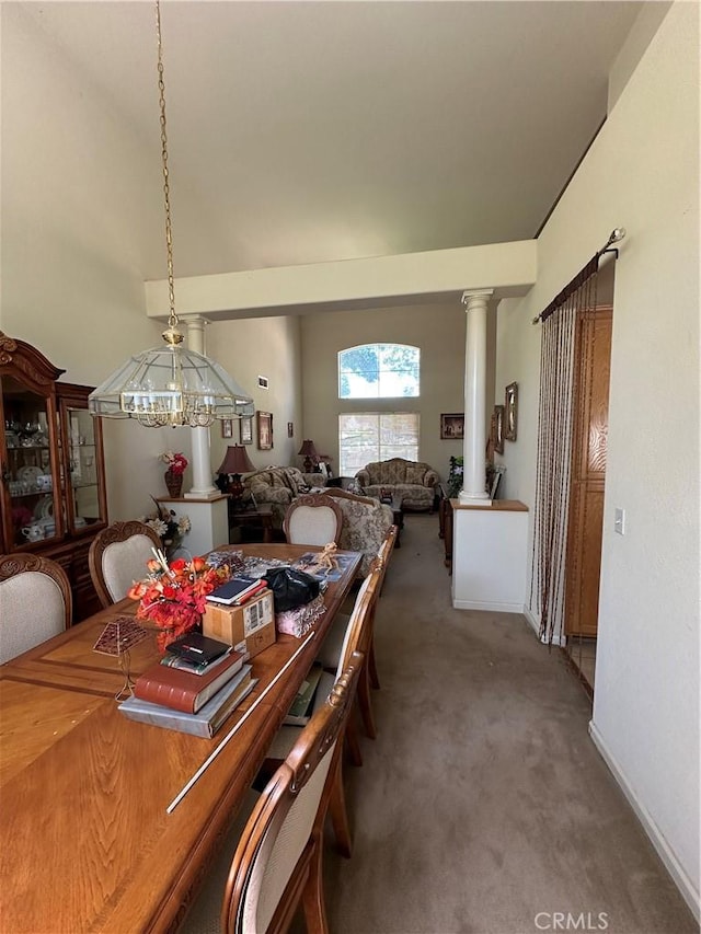 1612 Via Colabria, Gustine, CA 95322 - dining area featuring decorative columns, carpet floors, and baseboards