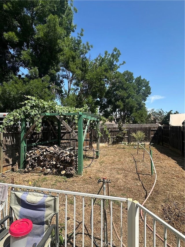1612 Via Colabria, Gustine, CA 95322 - fenced backyard featuring a playground
