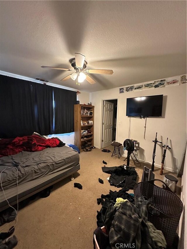 1612 Via Colabria, Gustine, CA 95322 - carpeted bedroom with a textured ceiling and ceiling fan