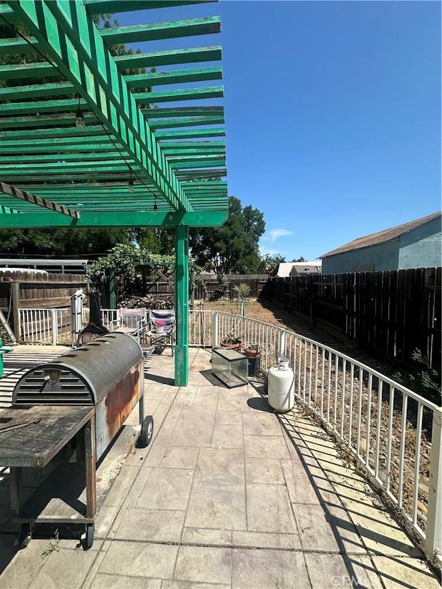 1612 Via Colabria, Gustine, CA 95322 - fenced backyard featuring a patio area and a pergola