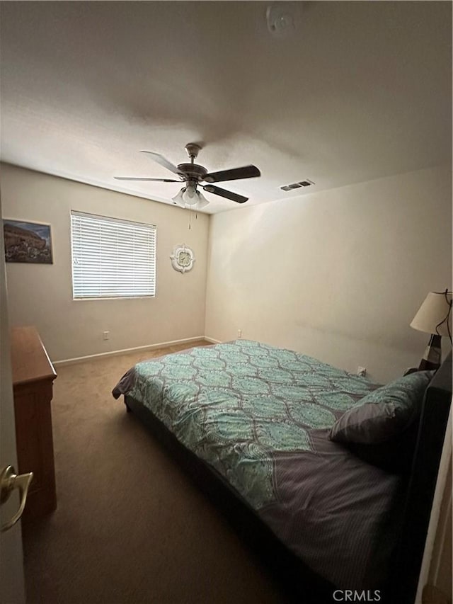 1612 Via Colabria, Gustine, CA 95322 - bedroom with carpet, baseboards, and ceiling fan