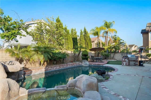 9534 Tivoli Cir, Cypress, CA 90630 - view of pool featuring a fenced backyard, a patio, a pool with connected hot tub, and a grill