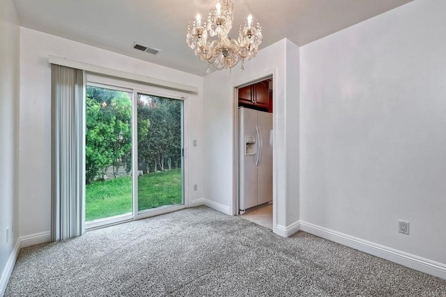 1160 Via Trieste, Chula Vista, CA 91911 - unfurnished bedroom with white refrigerator with ice dispenser, light carpet, access to outside, and a chandelier