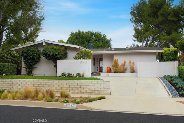27642 Avenida Del Mesa, Rancho Palos Verdes, CA 90275 - mid-century modern home with concrete driveway and stucco siding