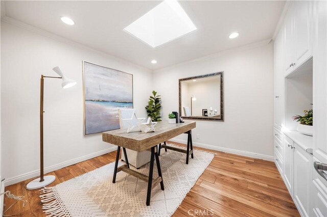 12 Rockrose Way, Irvine, CA 92612 - office featuring ornamental molding, light wood-style flooring, baseboards, recessed lighting, and a skylight