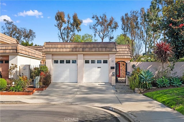 12 Rockrose Way, Irvine, CA 92612 - garage featuring driveway