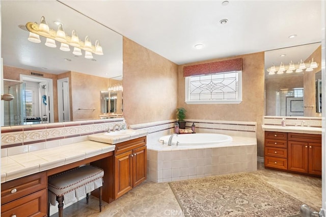 18912 Rockinghorse Ln, Huntington Beach, CA 92648 - bathroom featuring two vanities, a bath, healthy amount of natural light, and a shower with door