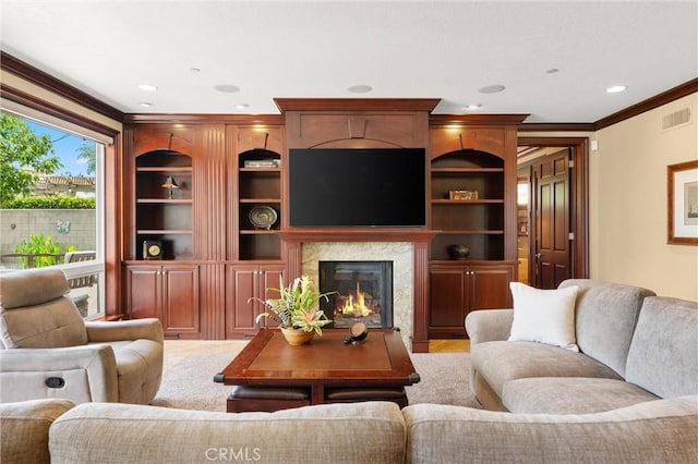 18912 Rockinghorse Ln, Huntington Beach, CA 92648 - living room with crown molding, a high end fireplace, and recessed lighting