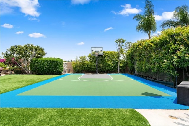 18912 Rockinghorse Ln, Huntington Beach, CA 92648 - view of basketball court featuring basketball hoop and a lawn
