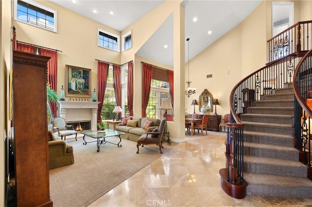 18912 Rockinghorse Ln, Huntington Beach, CA 92648 - building lobby featuring a high ceiling, stairway, and recessed lighting