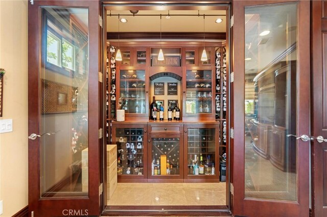 18912 Rockinghorse Ln, Huntington Beach, CA 92648 - indoor dry bar featuring decorative light fixtures