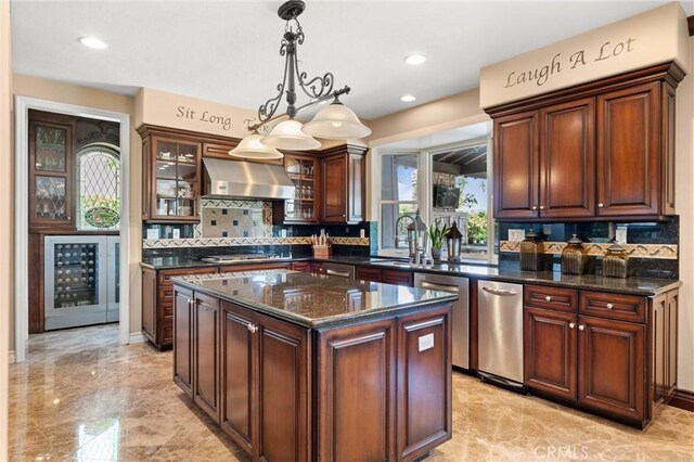 18912 Rockinghorse Ln, Huntington Beach, CA 92648 - kitchen featuring wall chimney range hood, wine cooler, backsplash, pendant lighting, and stainless steel dishwasher