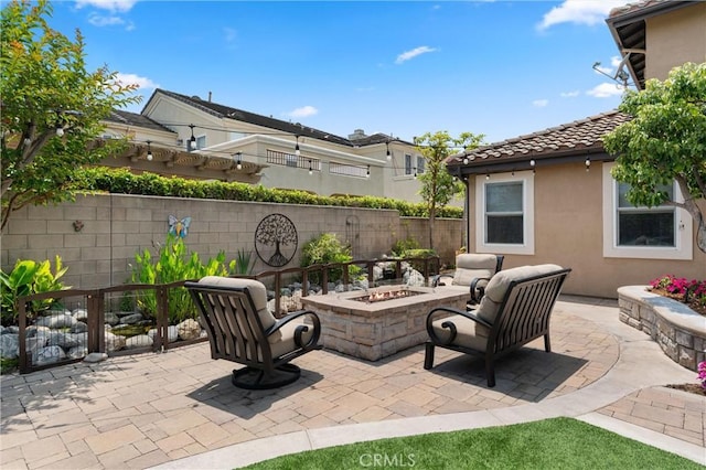 18912 Rockinghorse Ln, Huntington Beach, CA 92648 - view of patio / terrace with a fire pit
